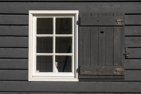 Black wall with white window frame Stock Photos