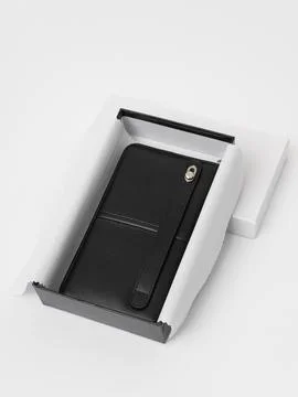 Black wallet in gift box view Stock Photos
