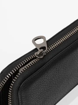 Black wallet zipper pull close-up Stock Photos
