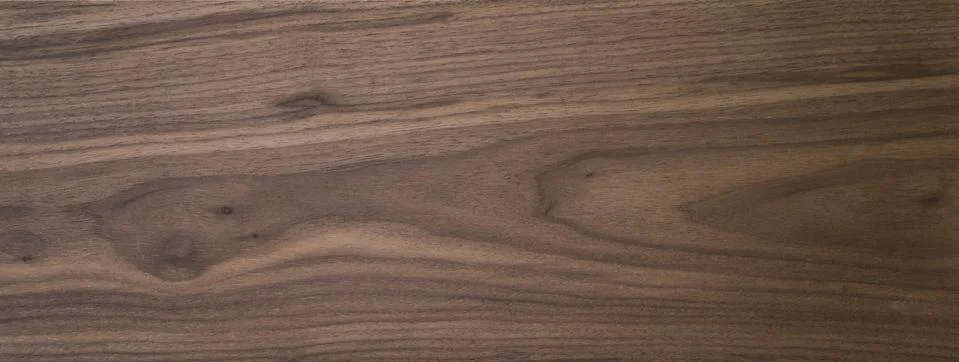 Black walnut wood texture of solid board untreated Stockfoto's