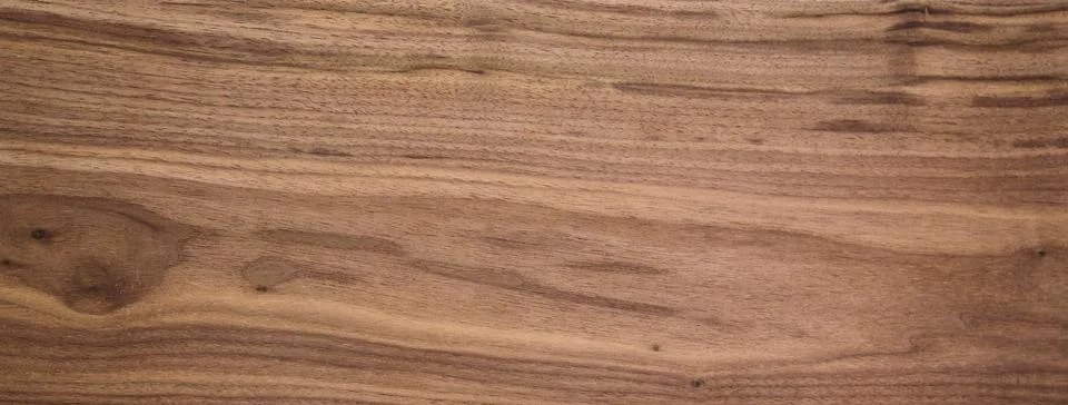 Black walnut wood texture of solid board untreated Stockfoto's