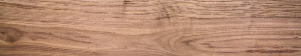 Black walnut wood texture of solid board untreated Stockfoto's