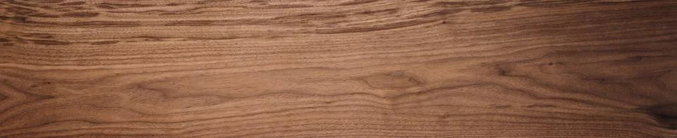 Black walnut wood texture of solid board untreated Stockfoto's