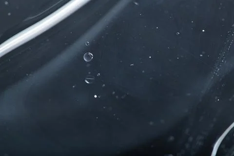 Black water background with bubbles Stock Photos