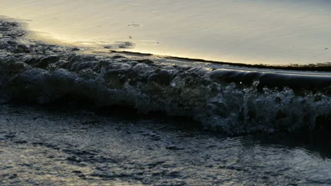 Black waves run a shore Stock Footage 135404231