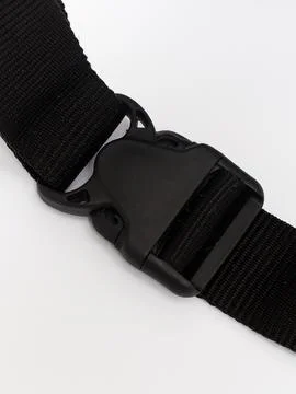 Black webbing strap buckle hardware close up variant three Stock Photos
