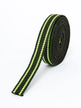 Black webbing strap with green stripe unrolled Stock Photos