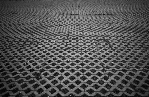 Black &amp; white pavement texture background Stock Photos