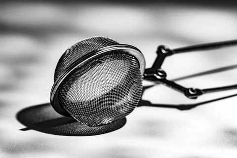 Black &amp; White Tea Infuser Object Photo Stock Photos