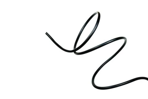 Black wire cable isolated on a white background abstraction. Stock Photos