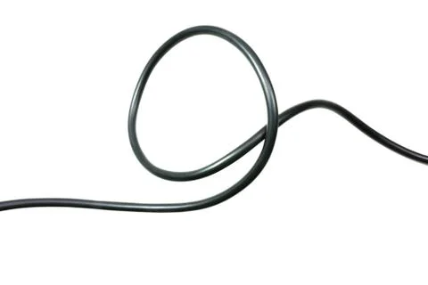Black wire cable isolated on a white background abstraction. Stock Photos