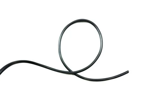 Black wire cable isolated on a white background abstraction. Stock Photos