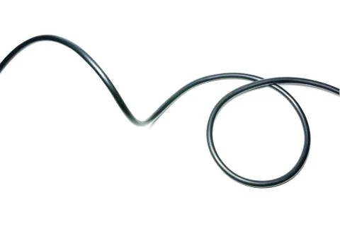 Black wire cable isolated on a white background abstraction. Stock Photos