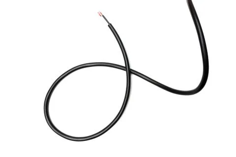 Black wire cable isolated on a white background abstraction. Foto stock