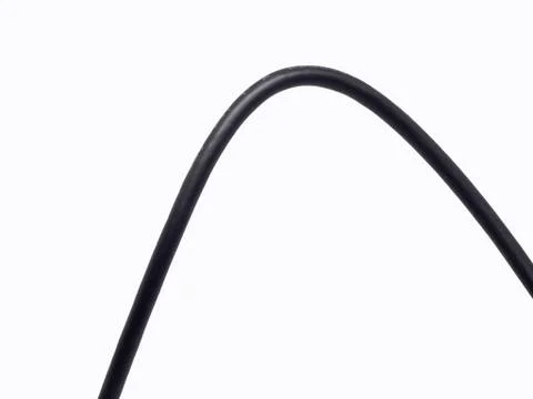 Black wire cable on isolated white background Stock Photos