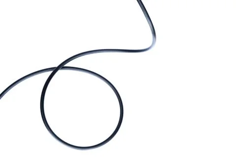 A Black wire cable isolated on a white background abstraction. Stock Photos