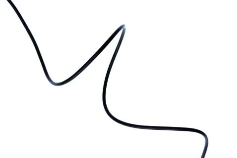 A Black wire cable isolated on a white background abstraction. Foto stock
