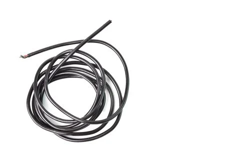 Black wire over white background. Stock Photos