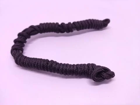 Black wired boot laces isolated on white background Stock Photos