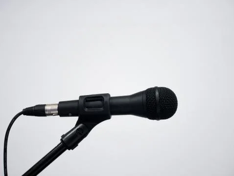 Black wired microphone on stand Stock Photos