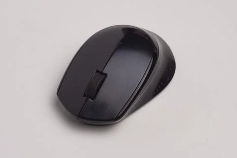Black wireless computer mouse isolated on white background, top view. Fotos Stock