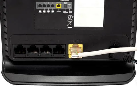 Black wireless internet network wi-fi router isolated on white background Stock Photos