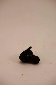 A Black Wireless JBL Earbuds Stock Photos