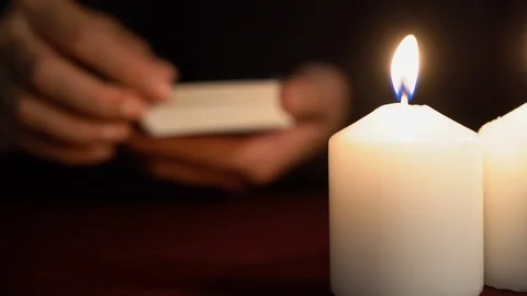 A black witch is fortune teller shows tarot card of 4 Arcana: The Emperor. Stock Footage 117805581