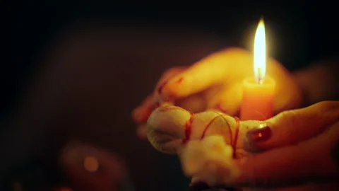 Black witch marking voodoo doll with blood, black magic, evil witchcraft, horror 스톡 동영상 197981565