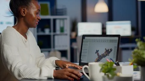 Black woman architect working in modern cad program at laptop Stock Photos