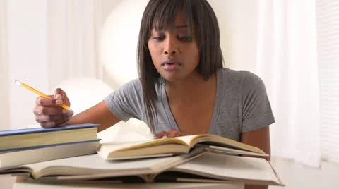Black woman college student studying for finals Stock Footage