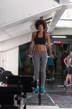 Black woman doing parallel bars Exercise 스톡 사진