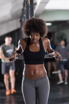 Black woman doing parallel bars Exercise 写真素材