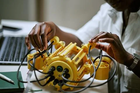 Black Woman Engineer Assembling Underwater Drone in Laboratory Stock Photos