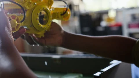 Black Woman Engineer Testing Underwater Robot in Water Tank Stock Footage 343526980
