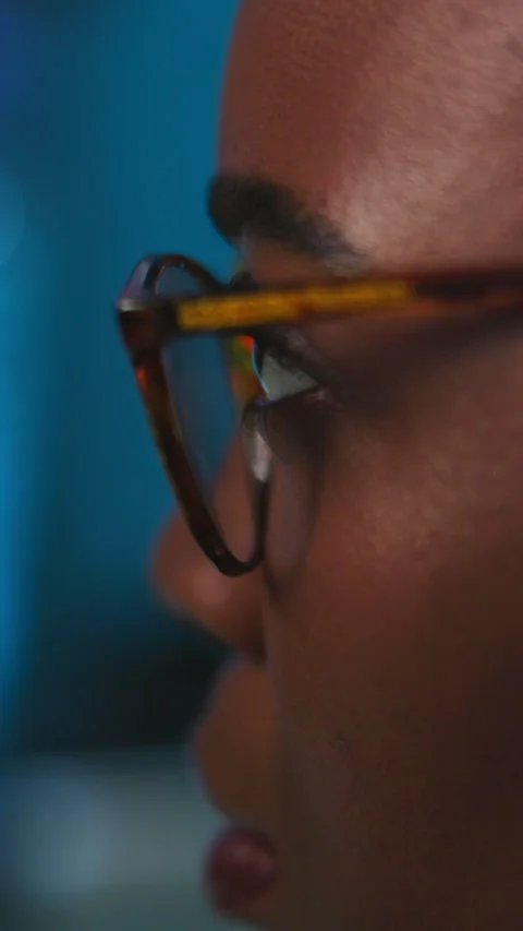 Black woman, night and programmer with glasses in office for software Video stock 333673673