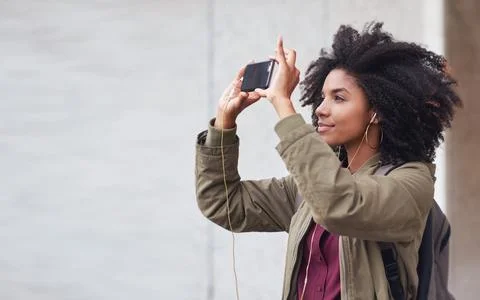 Black woman, phone photography and travel in the city for tourism or sightseeing Stock Photos