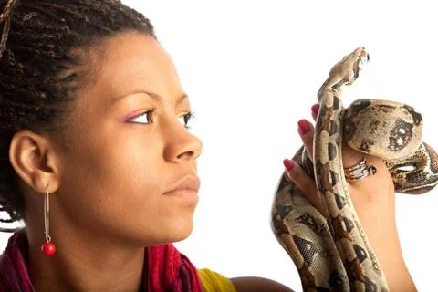 Black woman with python Stock Photos