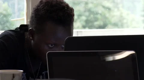 Black woman using a computer Stock Footage 47850088