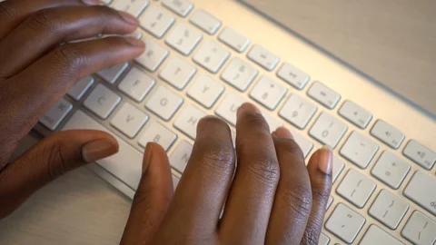 Black woman's hands typing, writing blog article for small business Video stock 112164304