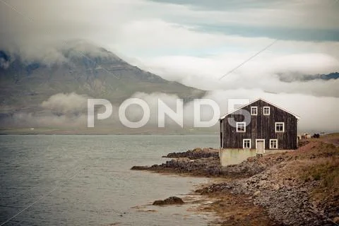 Black wooden house in east iceland Stock Photos