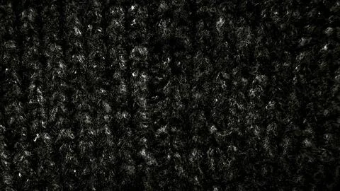Black wool knit texture macro view fibrous strands subtle sheen cozy dark abs Stock Photos