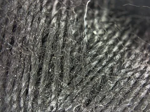 Black yarn thread texture close up macro concept for knitting, textile industry, 库存照片