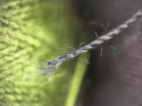 Black yarn thread texture close up macro concept for knitting, textile industry, 库存照片