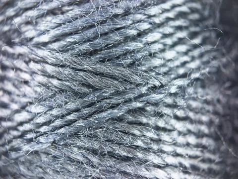 Black yarn thread texture close up macro concept for knitting, textile industry, 库存照片