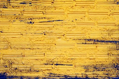 Black-yellow wall from bricks for background. Stock Photos