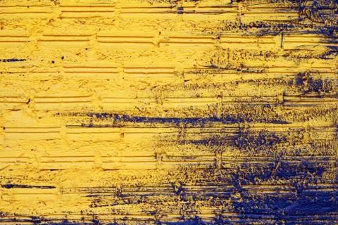 Black-yellow wall from bricks for background. Stock Photos