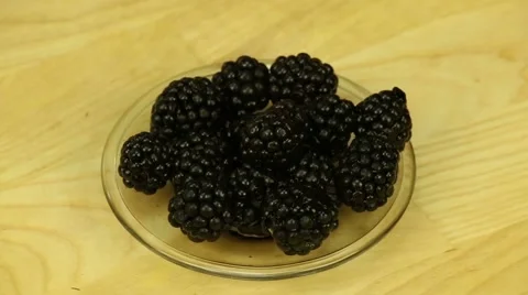 Blackberries in a glass dish Stock Footage 44696974