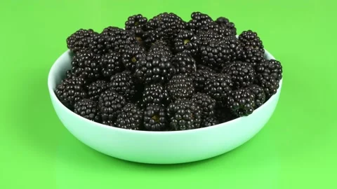 Blackberries on a plate. Side view. Loop motion. Rotation 360. Stock Footage 163803210