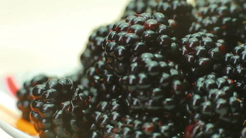 BlackBerry is rotating in the plate. Video stock 94008756